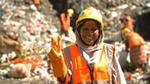 Smiling Plastic Waste Worker