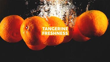 Tangerines sinking in water, signifying freshness