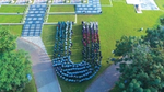 Drone shot of the Unilever factory employees in a shape of U