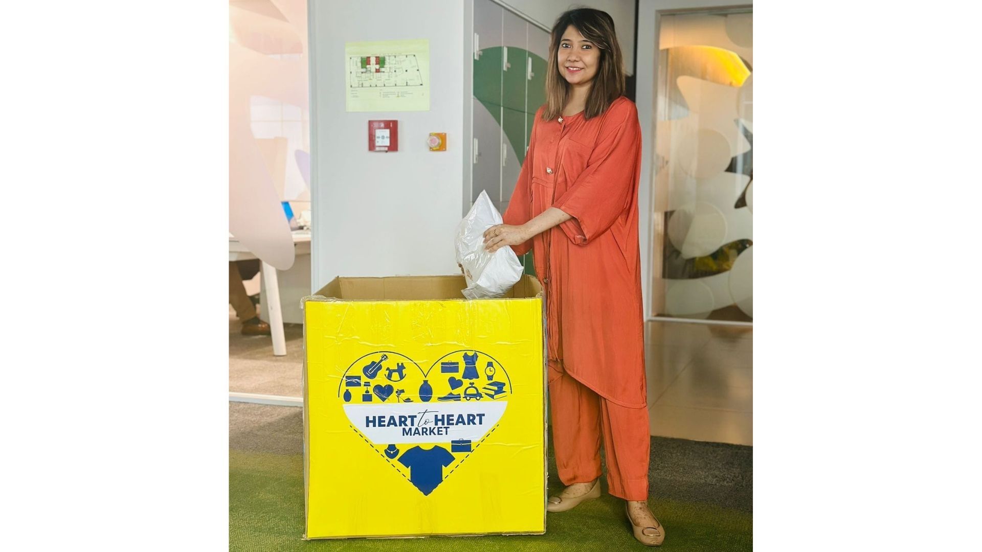 UBL Employee donating personal belongings to the Heart-to-Heart market