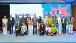 Group photo of UBL representatives on stage with all the entrepreneurs