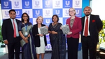 H. E Baroness Rosie Winterton and H.E Sarah Cooke receiving the Jatra publication from UBL Senior Leadership